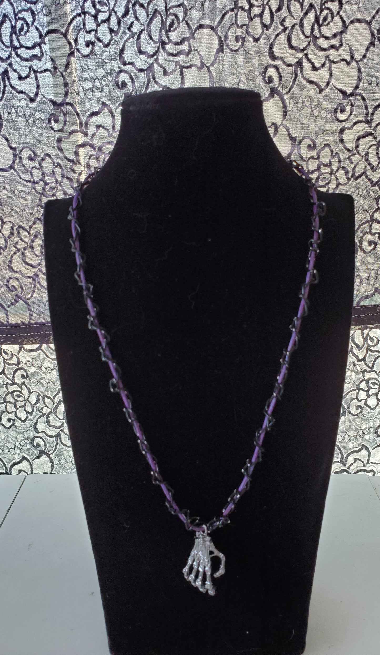 Skeleton Hand Pendant On Braided Chain Necklace