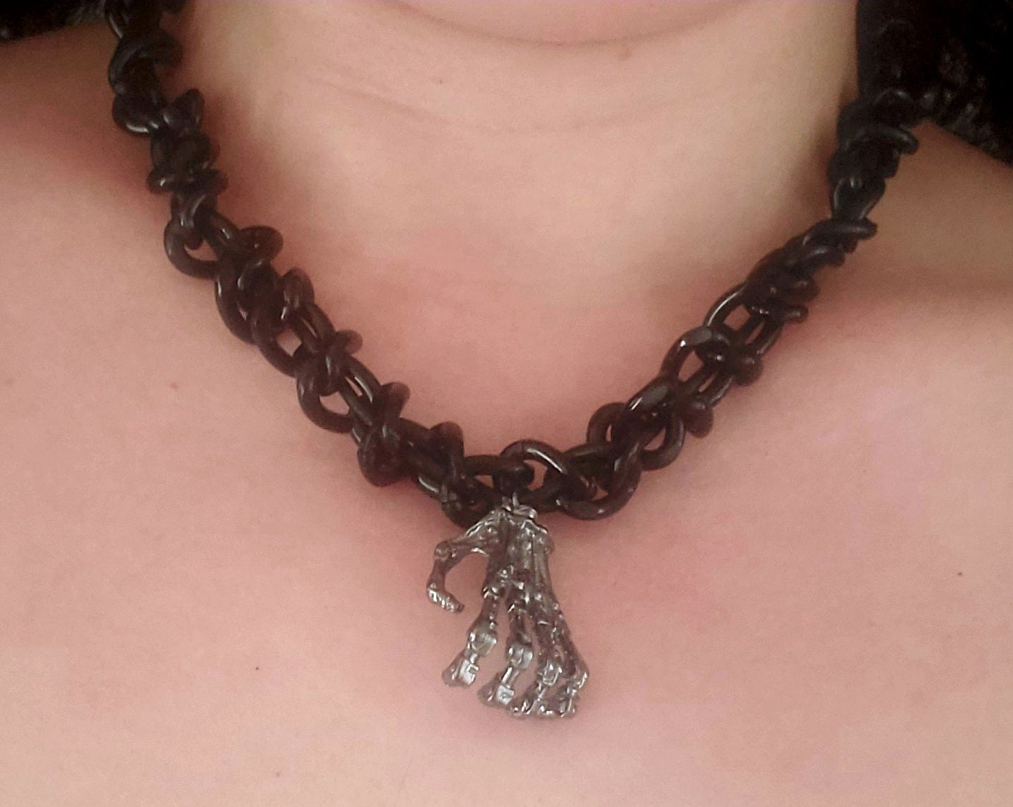 Skeleton Hand Pendant on Large Braided Chain Necklace