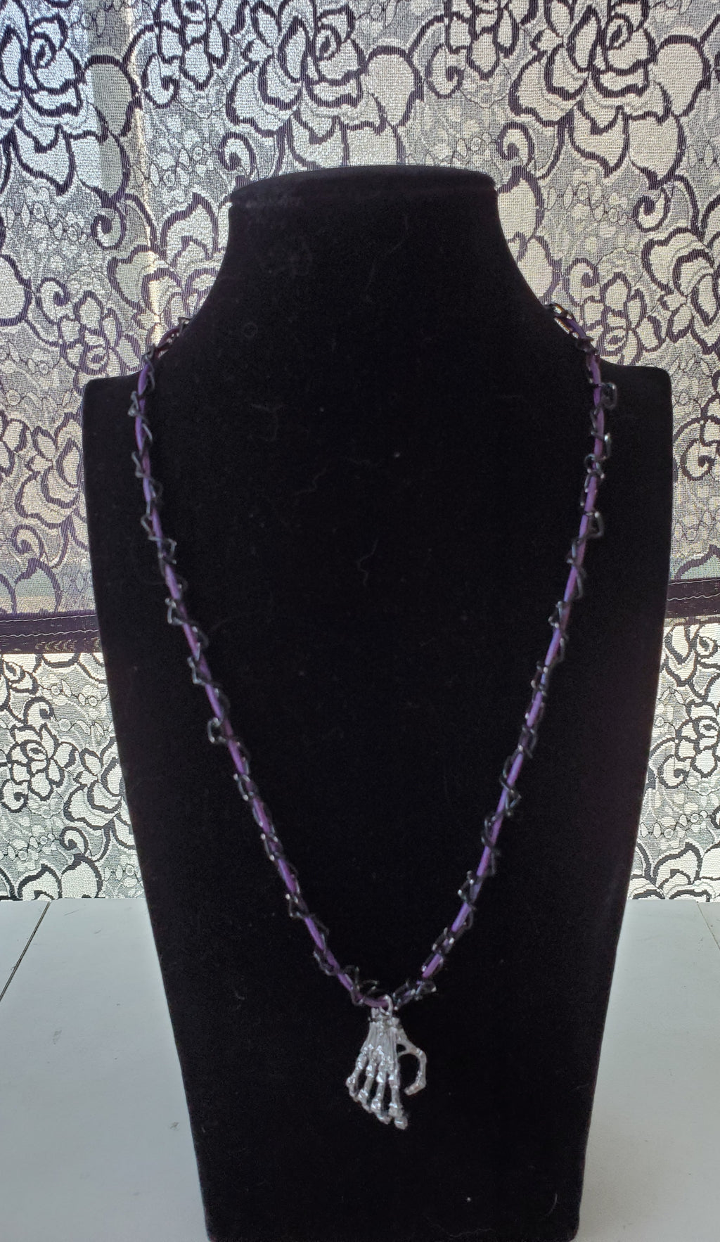 Skeleton Hand Pendant On Braided Chain Necklace