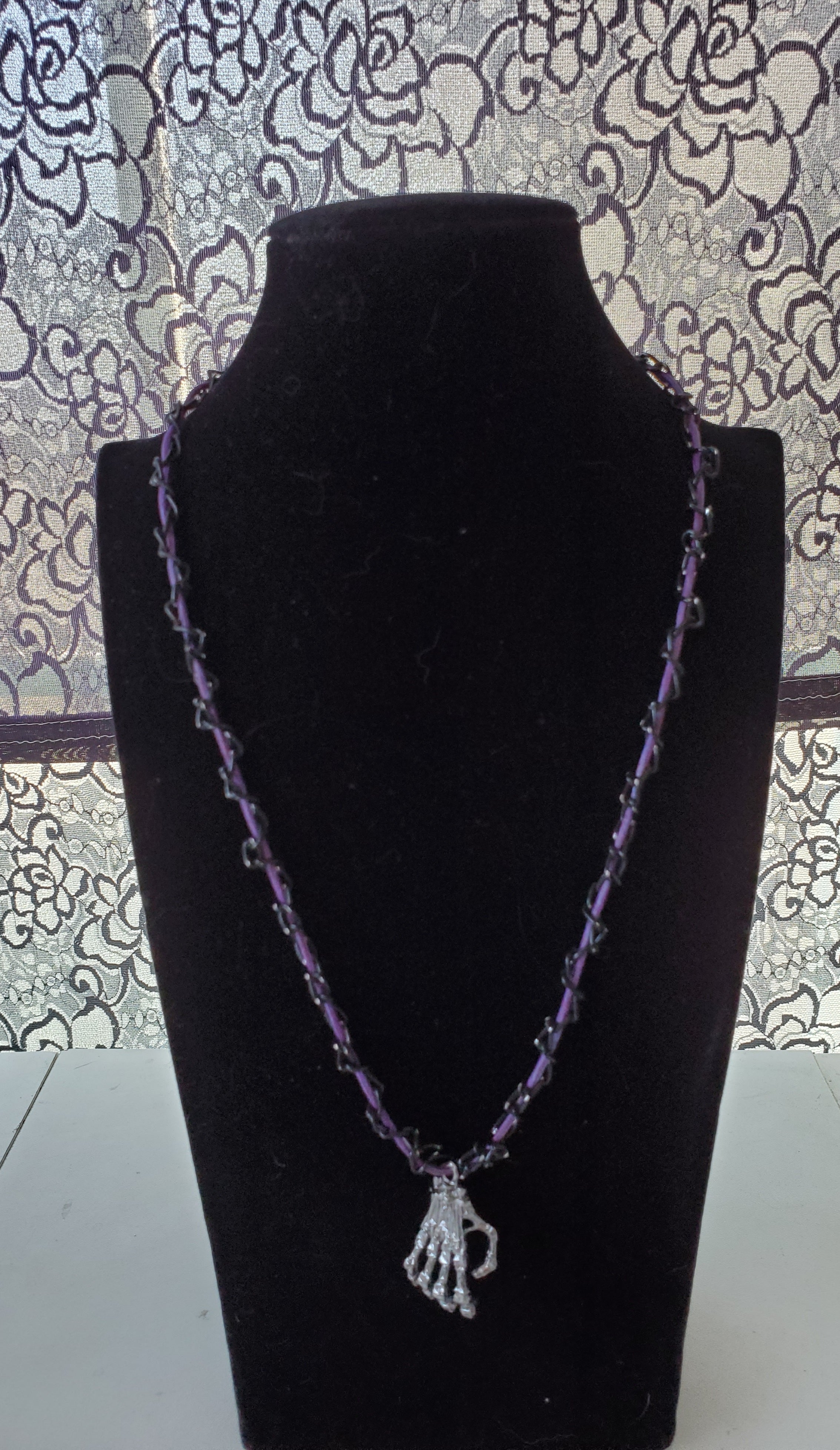 Skeleton Hand Pendant On Braided Chain Necklace